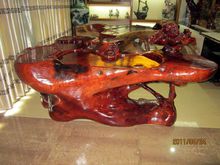 花梨木根雕艺术茶几(图片由广西源野提供)